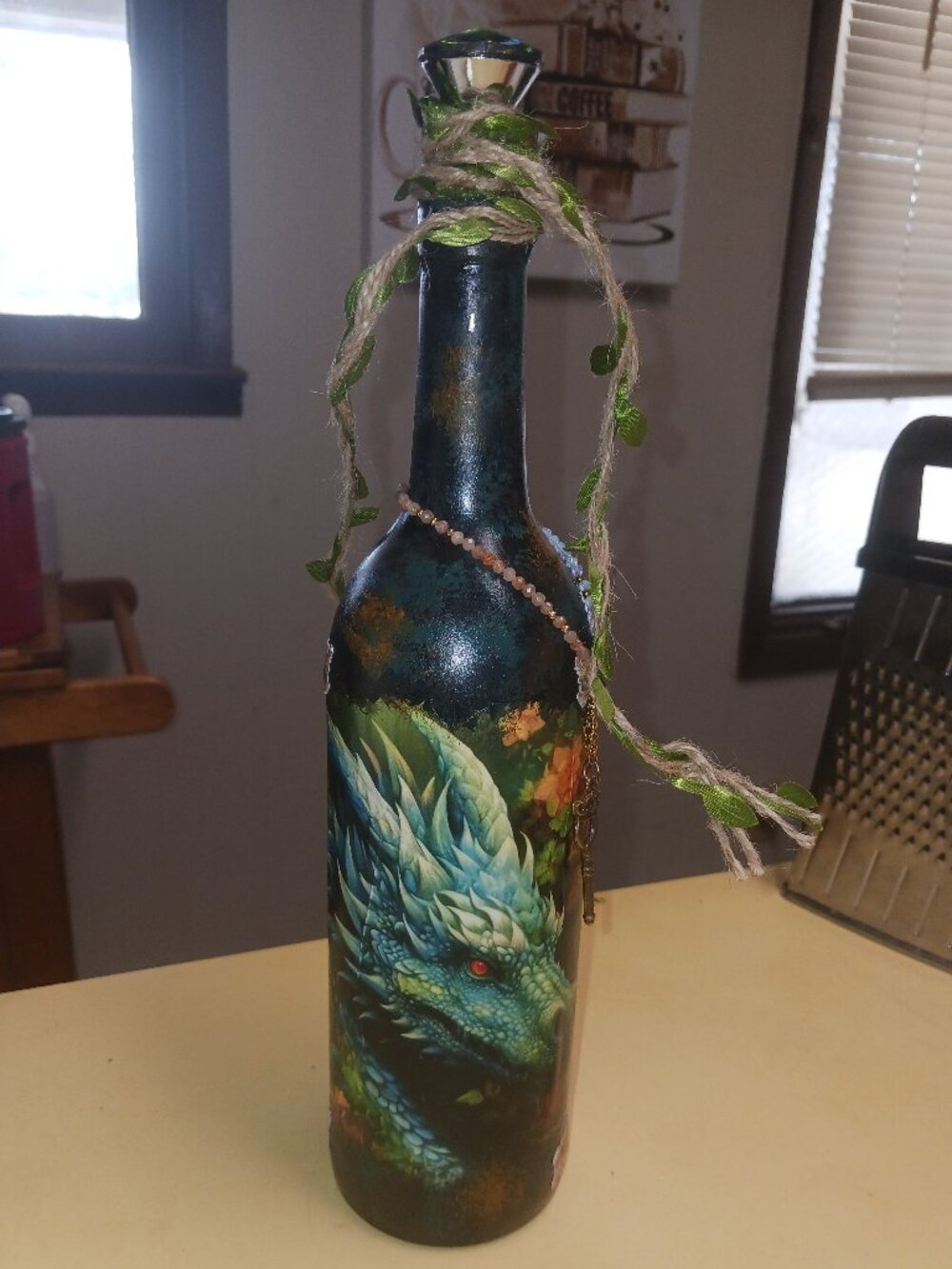 Dragon "potion" bottle. (Empty) hand decorated